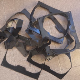 A bunch of early failed prints. Note I've been testing if the prints could be smoothed out with a heat gun on those. Doesn't work.