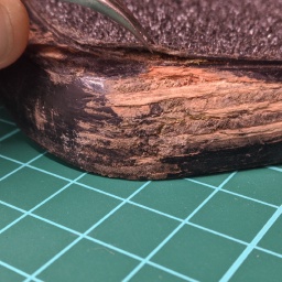 The sensor layers separated by repeated scraping on the asphalt.