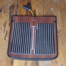 The footpad sanded clean of the lacquer it came with and painted with black spray paint (sprayed into a cup and applied with a brush).