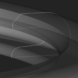 The profile is tuned to fit nice and snug over the rim, it won't wedge out when the tire is pressed against it.