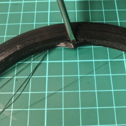 Pry the support out.