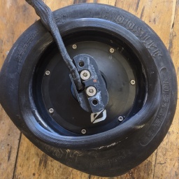 Work your way around and press the Rim Saver onto the rim. Around halfway through is the toughest part, I find what works best is to press the Rim Saver down onto the rim with your palm. By forcing it down it should gradually pop into place.