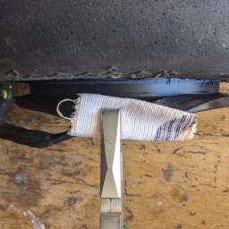 Getting the Rim Saver off is really easy with a pair of pliers. I'm using a piece of cloth here to not mangle it but that was just to keep it neat for the pictures.